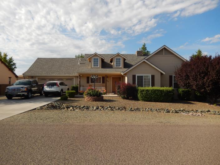 Go traditional with a classic style home that features a 2 car garage, lovely siding, and shutters. 